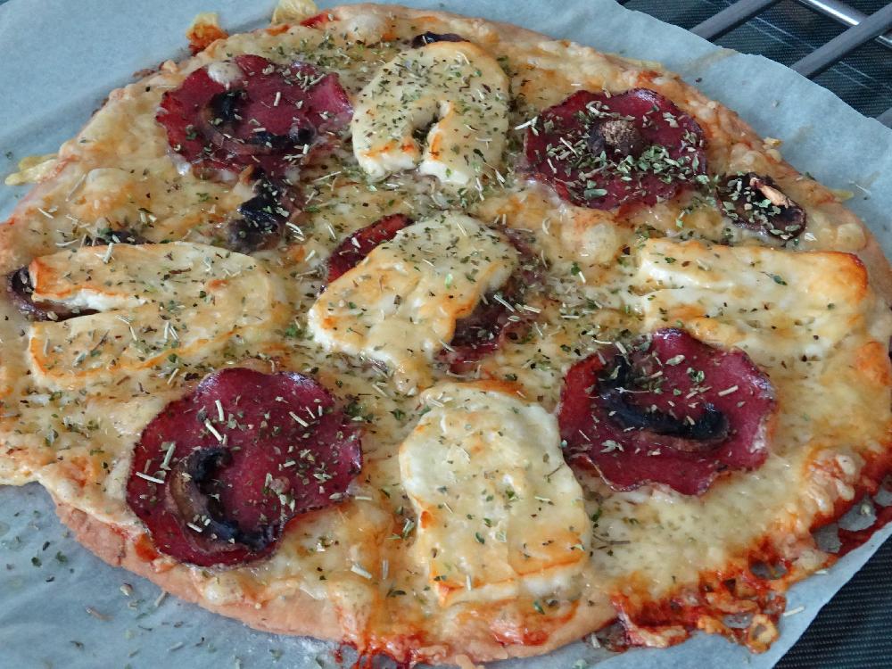 Tortilla pizza with halloumi cheese and salami picture